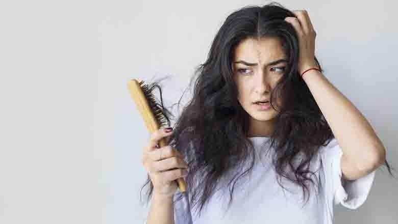 Here's how you can stop hair fall