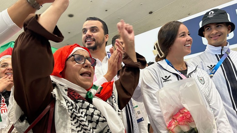 Palestinian athletes greeted with cheers and gifts at Paris Olympics