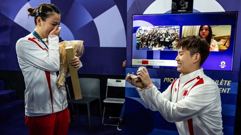 Teammate surprises Chinese gold medalist with marriage proposal at Paris Olympics