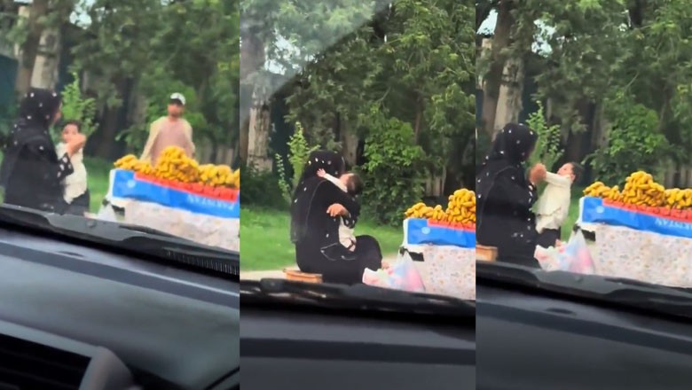 Woman sells fruits on cart with her newborn to support her family