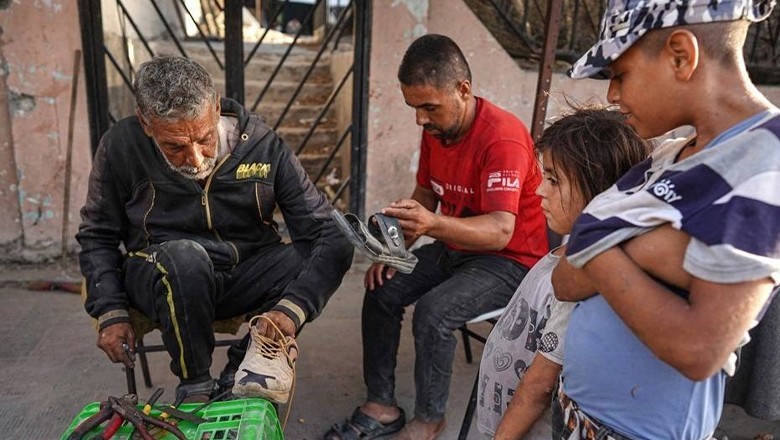 Besieged people in Gaza share shoes, wear same clothes for months