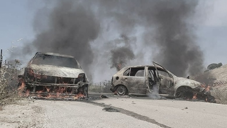 Israeli settlers assault Palestinians, torch farmland in West Bank