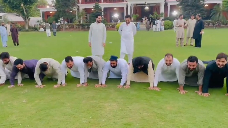 WATCH: PTI workers getting ready for tomorrow's Lahore rally