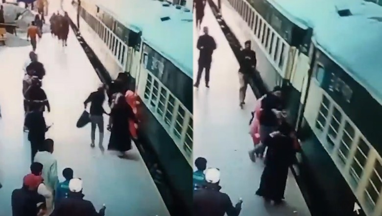 Railway officer prevents woman from falling under moving train at Lahore station