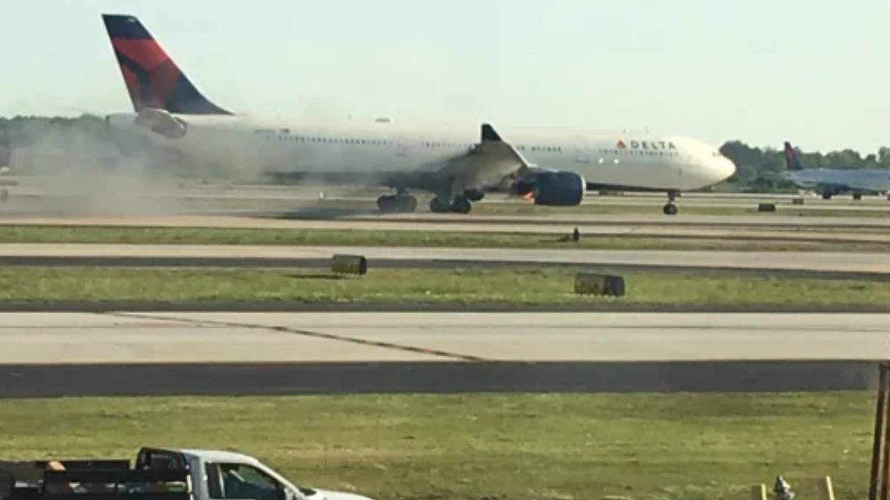 Delta passengers evacuated after flames erupt from plane engine