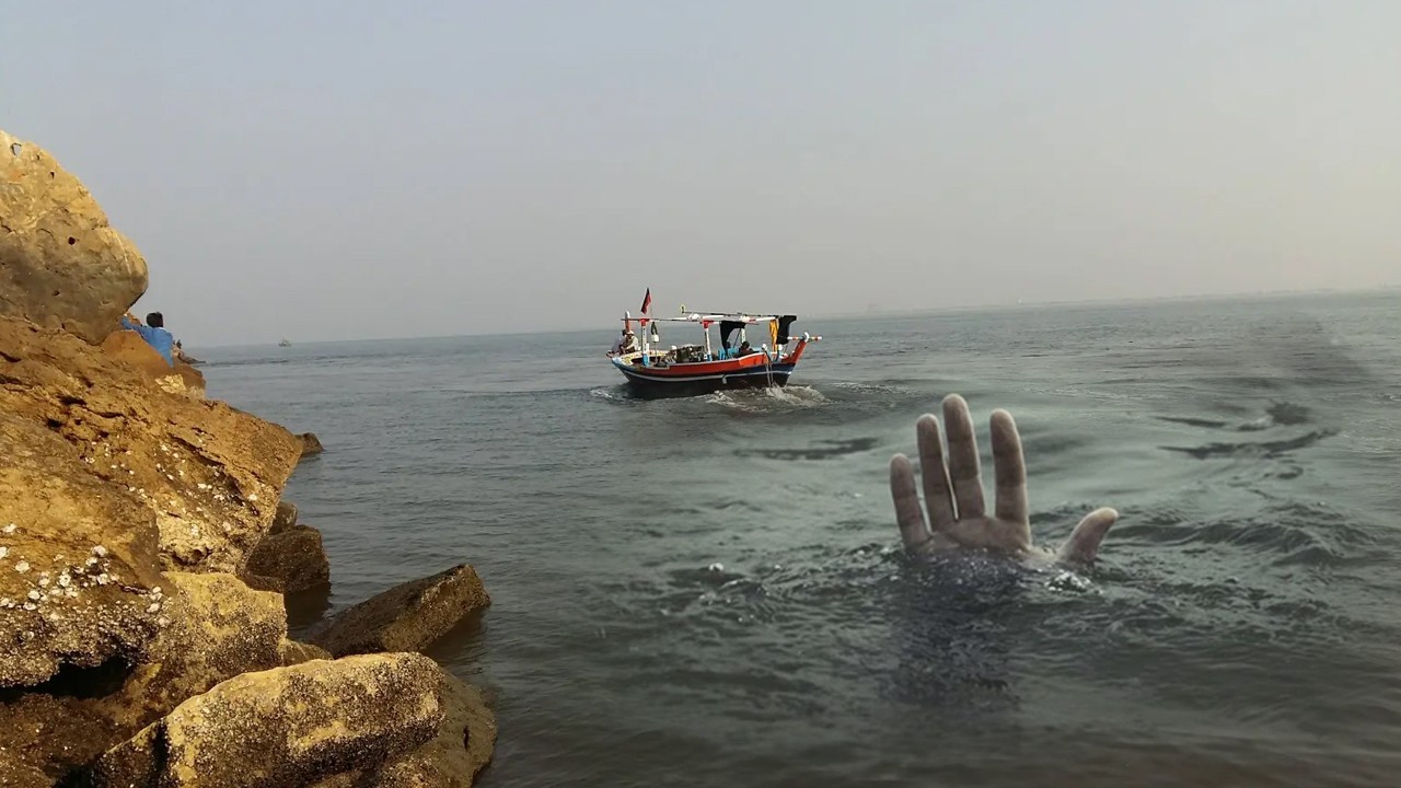 Man jumps into sea with two children